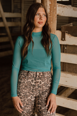 Front view of Sterling Kreek turquoise mesh layering top for women