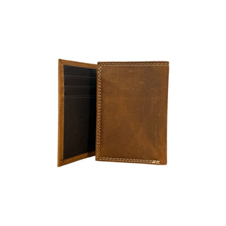 Ariat brown genuine leather trifold wallet with embossed shield logo, contrast stitching, multiple card slots, clear ID window, and full-length bill compartment.