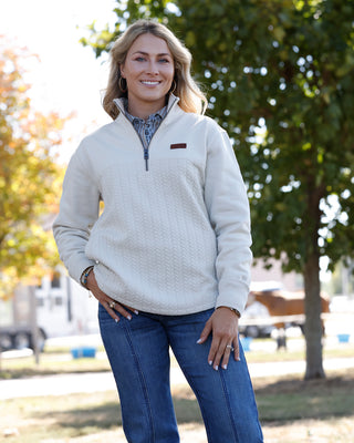 Cinch Women’s cream 1/4 zip pullover styled with jeans