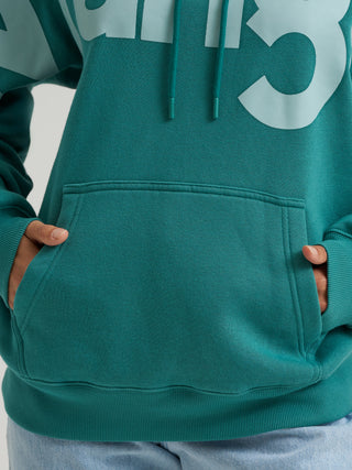 Wrangler women’s teal oversized logo hoodie with kangaroo pocket and oversized front logo