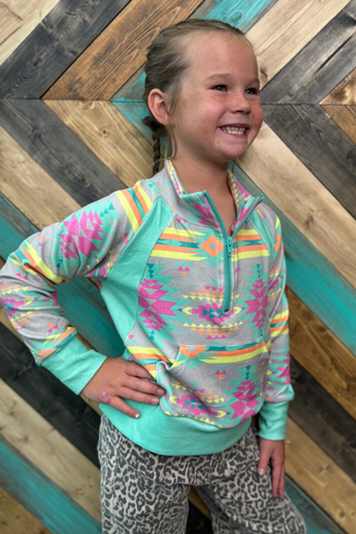 Sterling Kreek girls Mini Aztec Daydream pullover with turquoise panels and colorful Aztec print