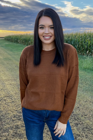 Sterling Kreek Women’s brown crew neck sweater with denim