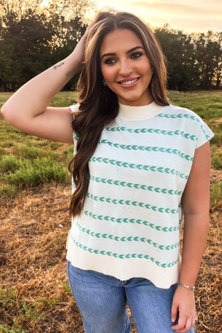 Sterling Kreek Turquoise Trails sweater top layered over turquoise long sleeve shirt
