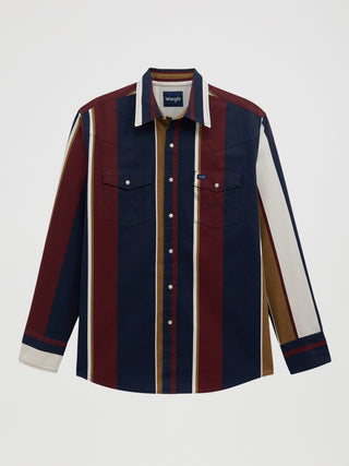 Wrangler men’s Retro Brushpopper long sleeve snap shirt featuring navy, burgundy, gold and cream vertical stripes, pearl snaps, Western yokes, and dual chest pockets.