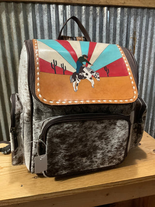 Custom Western Cowboy Sunrise Backpack – Hand - Painted Leather Flap with Hair - On Hide and Tooled Straps - Cowboy SwaggerCustom Western Cowboy Sunrise Backpack – Hand - Painted Leather Flap with Hair - On Hide and Tooled Straps