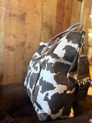 Nocona Jessi Ray Conceal Carry Large braided Cow Print Tote Bage with Bandana Strap - Cowboy SwaggerNocona Jessi Ray Conceal Carry Large braided Cow Print Tote Bage with Bandana Strap