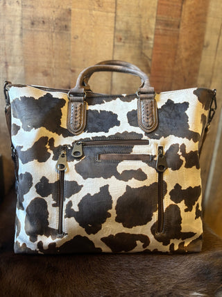 Nocona Jessi Ray Conceal Carry Large braided Cow Print Tote Bage with Bandana Strap - Cowboy SwaggerNocona Jessi Ray Conceal Carry Large braided Cow Print Tote Bage with Bandana Strap