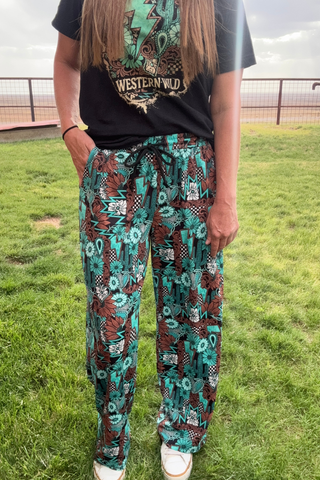 Sterling Kreek Women’s Tattoos in Turquoise Western Print Lounge Pants - Cowboy SwaggerSterling Kreek Women’s Tattoos in Turquoise Western Print Lounge PantsPants