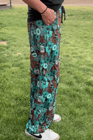 Sterling Kreek Women’s Tattoos in Turquoise Western Print Lounge Pants - Cowboy SwaggerSterling Kreek Women’s Tattoos in Turquoise Western Print Lounge PantsPants