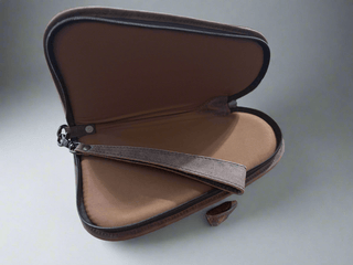 Tooled Leather and Cowhide Pistol Case – Western Handcrafted Gun Protector - Cowboy SwaggerTooled Leather and Cowhide Pistol Case – Western Handcrafted Gun Protector