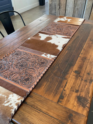 Western Cowhide Table Runner – Light Brown & White Hide with Tooled Leather Flowers - Cowboy SwaggerWestern Cowhide Table Runner – Light Brown & White Hide with Tooled Leather Flowers