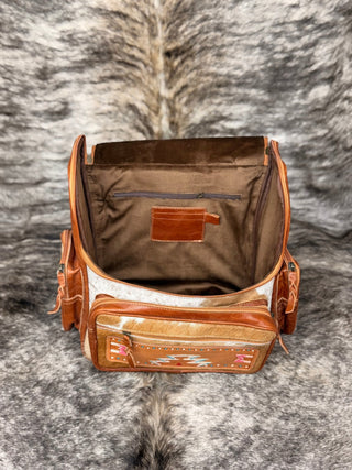 Western Pink and Turquoise Free Bird Tooled Cowhide Backpack – White and Tan Leather Hide Bag - Cowboy SwaggerWestern Pink and Turquoise Free Bird Tooled Cowhide Backpack – White and Tan Leather Hide Bag