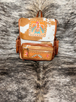 Western Pink and Turquoise Free Bird Tooled Cowhide Backpack – White and Tan Leather Hide Bag - Cowboy SwaggerWestern Pink and Turquoise Free Bird Tooled Cowhide Backpack – White and Tan Leather Hide Bag