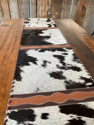 Western Table Runner – Black and White Cowhide with Brown Embossed Leather Trim - Cowboy SwaggerWestern Table Runner – Black and White Cowhide with Brown Embossed Leather Trim