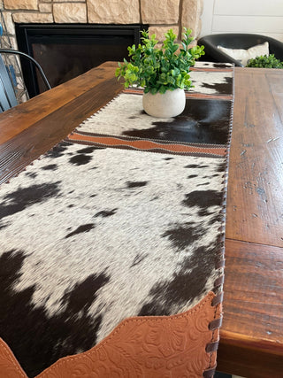 Western Table Runner – Black and White Cowhide with Brown Embossed Leather Trim - Cowboy SwaggerWestern Table Runner – Black and White Cowhide with Brown Embossed Leather Trim